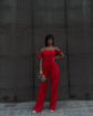 صورة Lady in red jumpsuit 